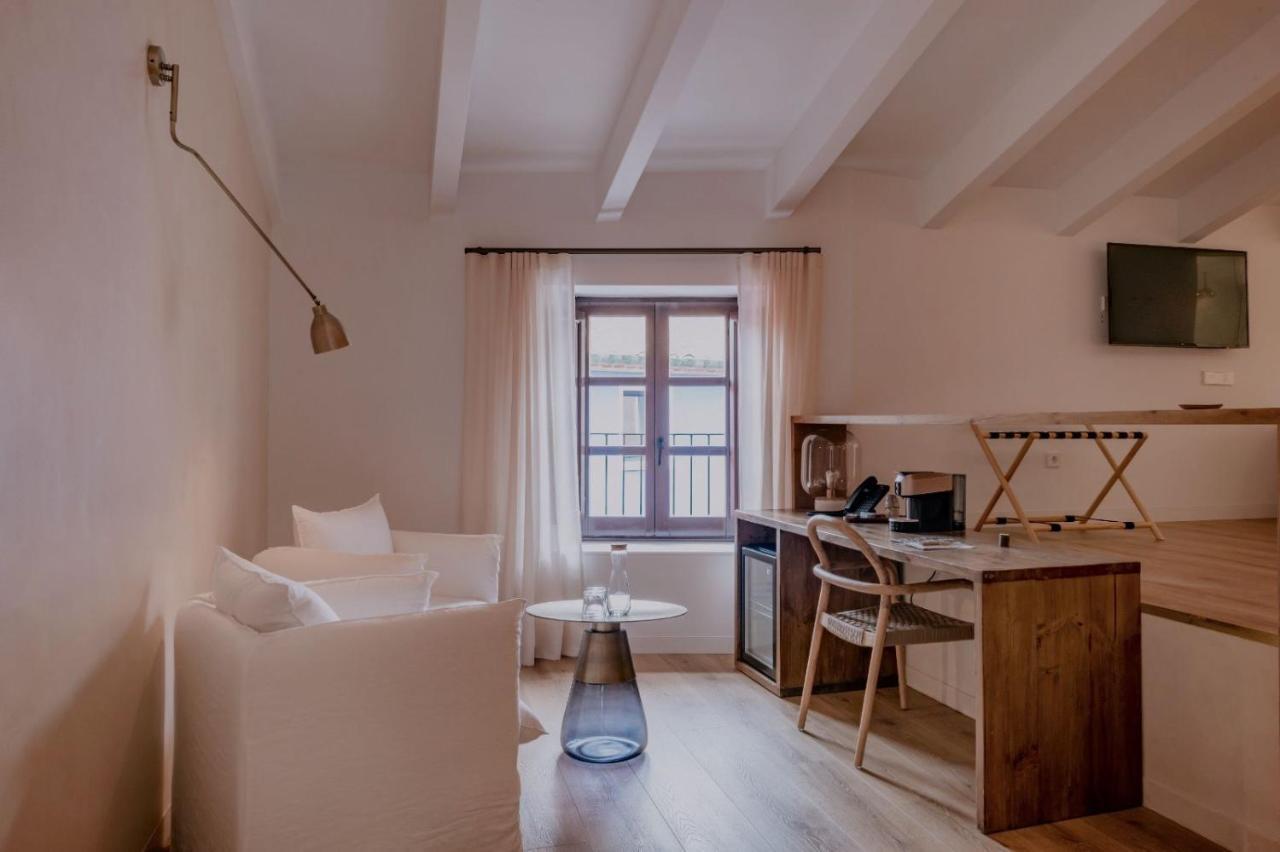 Palau Macelli & Hotel 4*
